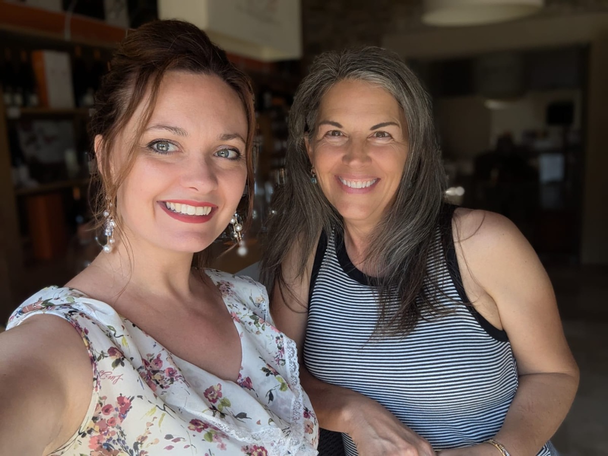 French teacher Eliane with her student enjoying a wine testing in South of France during French immersion program