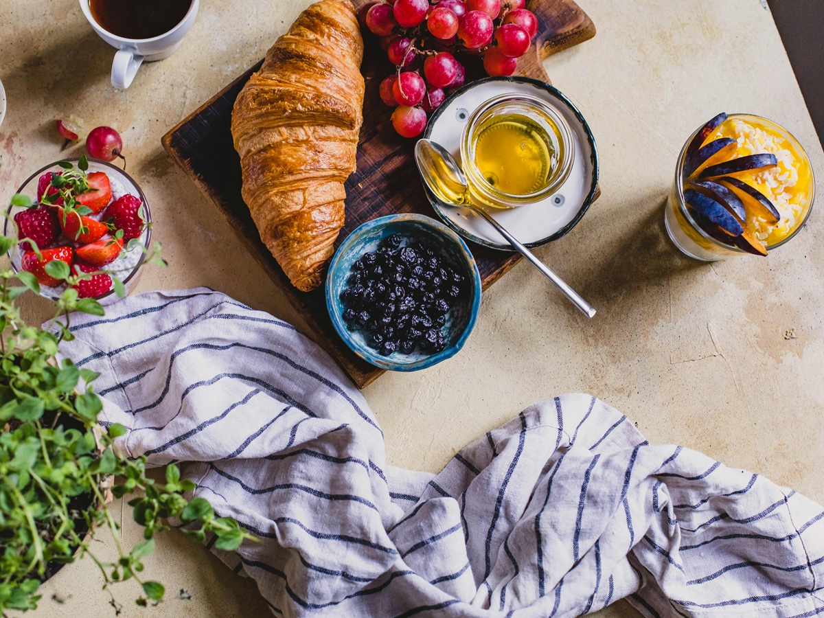 Fresh golden croissant served for French breakfast during a cultural immersion in Occitanie